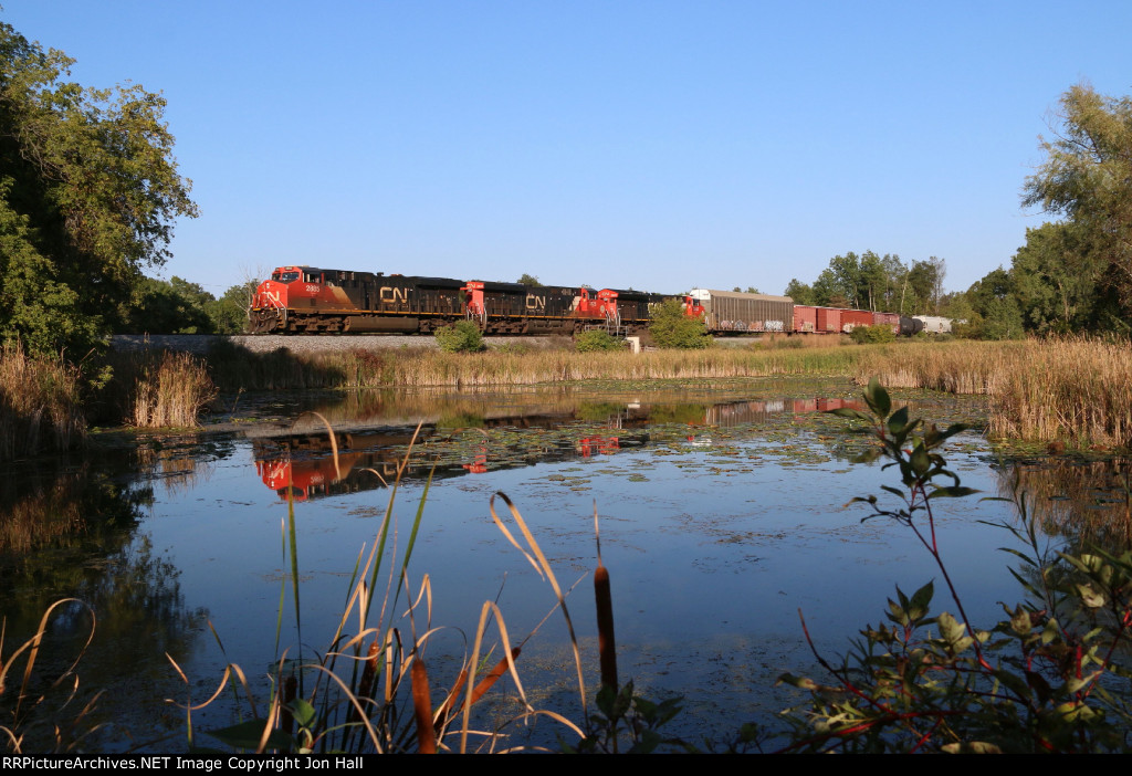 Heading north on the Holly Sub, E251 passes Mill Pond on a warm late summer evening